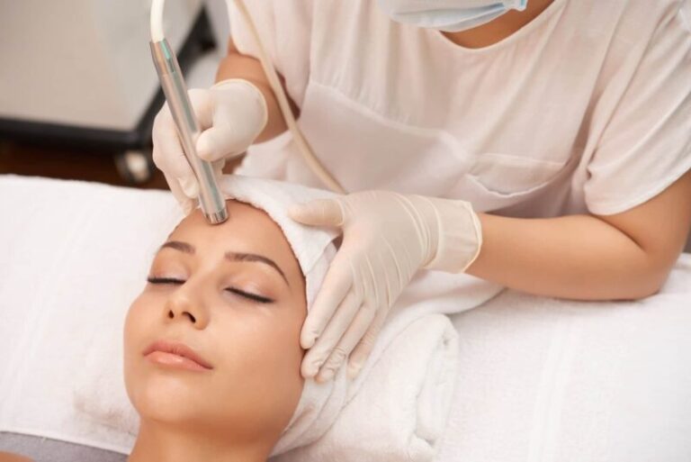 Woman getting a laser skin treatment